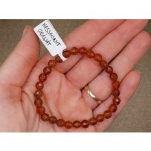 Hesszonit karkötő fazettált 6 mm