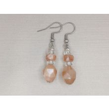 Napkő formadíszített füli