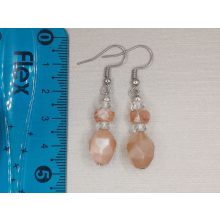 Napkő formadíszített füli