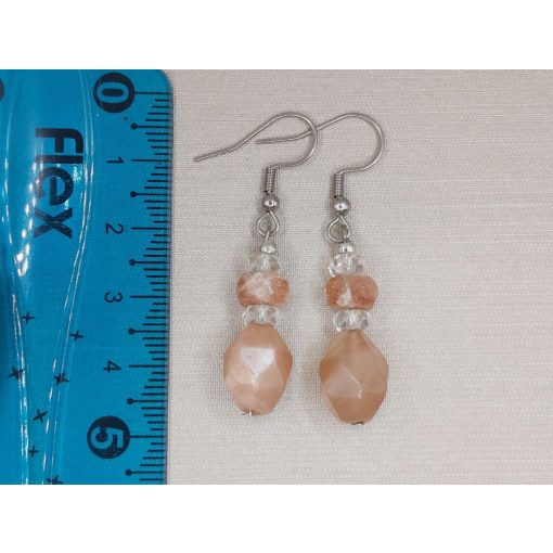 Napkő formadíszített füli