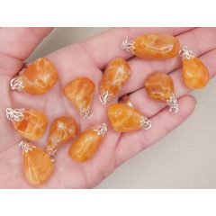 Narancs kalcit medál véletlenszerűen