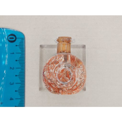 Réz lapocskák üvegben 