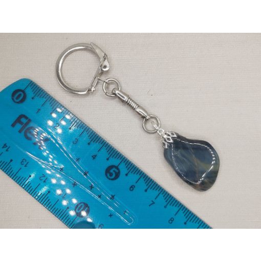 Sólyomszem kulcstartó véletlenszerűen