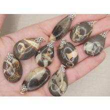 Szeptária medál kaboson véletlenszerűen