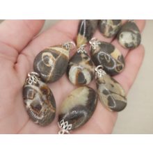 Szeptária medál kaboson véletlenszerűen