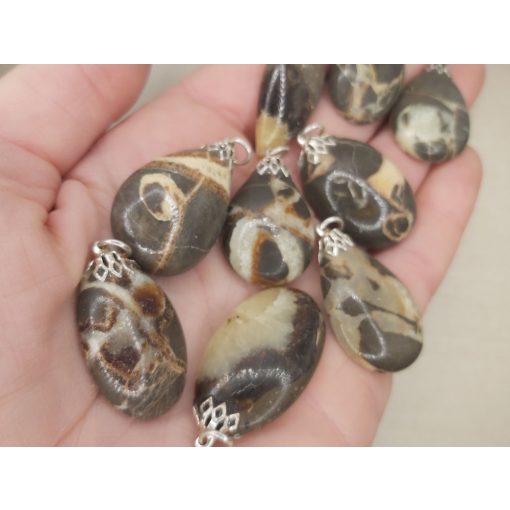 Szeptária medál kaboson véletlenszerűen