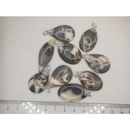 Szeptária medál kaboson véletlenszerűen