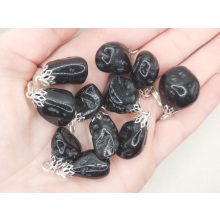 Tektit medál véletlenszerűen